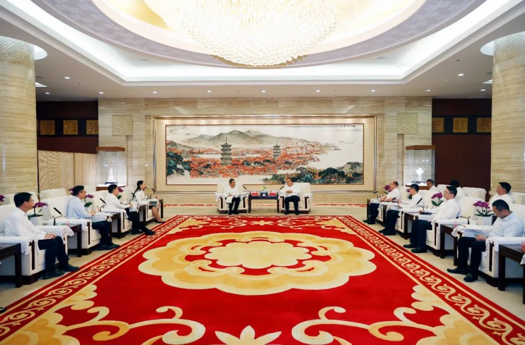 蔡战胜与农发行福建省分行行长冯学一行座谈交流